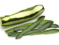 Zucchini with peeled isolated on a white background